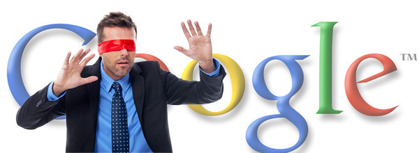 A businessman blindfolded and stumbling around in front of a large sign with Google's logo. 