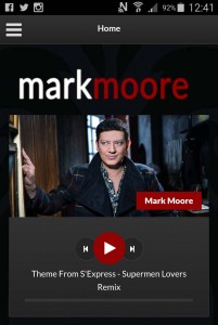 Website music player with a photo of Mark Moore on the home screen.